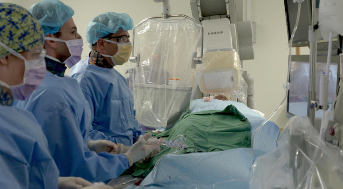 Associate Professor Barlis and the interventional cardiology team at St Vincent’s Hospital, Melbourne, discover a patient has two arteries with cholesterol deposits during a routine angiogram, using optical coherence tomography (OCT). They were able to insert two stents into the patient’s arteries, potentially saving his life. Picture: Paul Burston