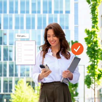 A smiling woman in a white shirt and dark pants holds a phone and laptop, with a checklist and checkmark graphic beside her.