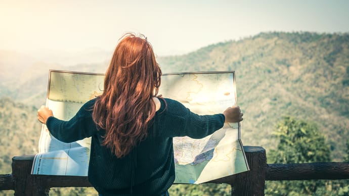 Woman looking on map