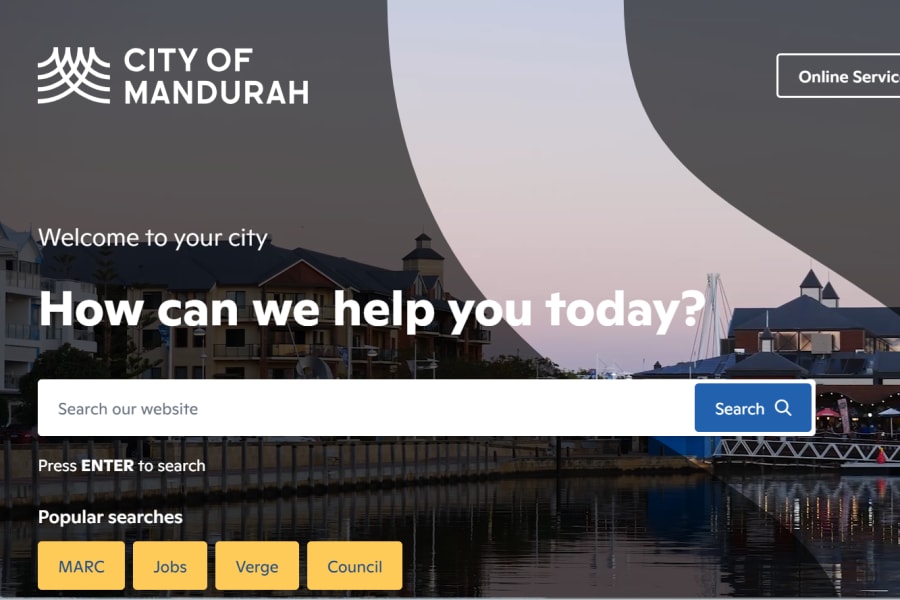 Homepage for the City of Mandurah with a search bar and popular search buttons over a waterfront background.